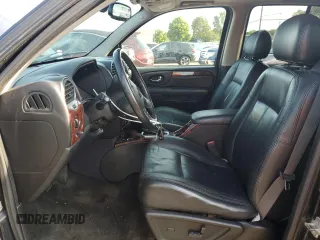 2006 GMC Envoy SLT with VIN 1GKDT13S862238613, listed as a Copart auction lot 70585704 with 147,337 mi miles and Salvage Title. Bid and sale history available at carsss.com. Image 7.