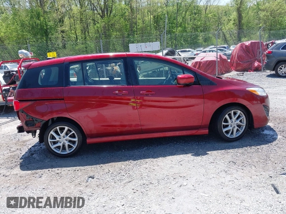 2012 Mazda 5 Grand Touring with VIN JM1CW2DL1C0123418, listed as a IAAI auction lot 42126956 with 112,411 mi miles and . Bid and sale history available at DreamBid. Image 13.