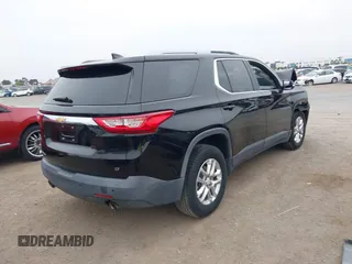 2018 Chevrolet Traverse LT Cloth z VIN 1GNERGKW4JJ127889, wystawiony jako IAAI lot #42368681 z przebiegiem 65 438 mil mil oraz . Historia ofert i sprzedaży dostępna na DreamBid. Obrazek 4.