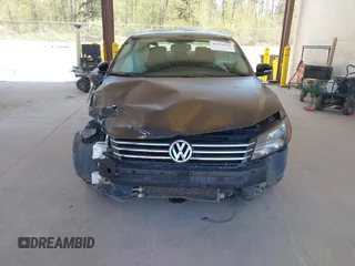 2015 Volkswagen Passat 1.8T Limited Edition with VIN 1VWAT7A36FC054484, listed as a IAAI auction lot 42078125 with 119,550 mi miles. Bid and sale history available at carsss.com. Image 13.