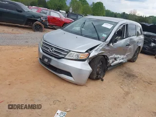 2013 Honda Odyssey LX with VIN 5FNRL5H27DB075559, listed as a IAAI auction lot 42007141 with Not Provided miles and . Bid and sale history available at carsss.com. Image 2.