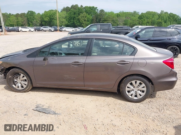 2012 Honda Civic LX with VIN 2HGFB2F57CH528266, listed as a IAAI auction lot 42094846 with 120,244 mi miles and . Bid and sale history available at DreamBid. Image 14.