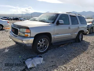 2004 GMC Yukon SLT with VIN 1GKEK13Z04J140148, listed as a Copart auction lot 52411494 with 167,629 mi miles and Salvage Title. Bid and sale history available at carsss.com. Image 1.