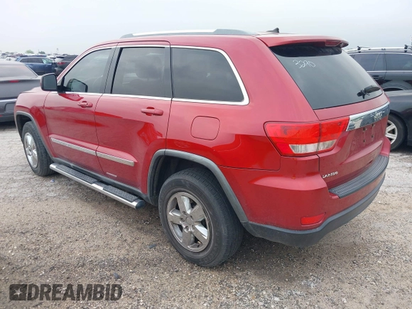 2011 Jeep Grand Cherokee Laredo with VIN 1J4RS4GG1BC673290, listed as a IAAI auction lot 42042557 with 147,590 mi miles and . Bid and sale history available at DreamBid. Image 3.