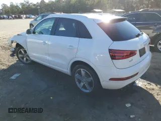 2015 Audi Q3 Premium Plus with VIN WA1BFCFS7FR014199, listed as a Copart auction lot 81987154 with 62,071 mi miles and Salvage title. Bid and sale history available at DreamBid. Image 2.