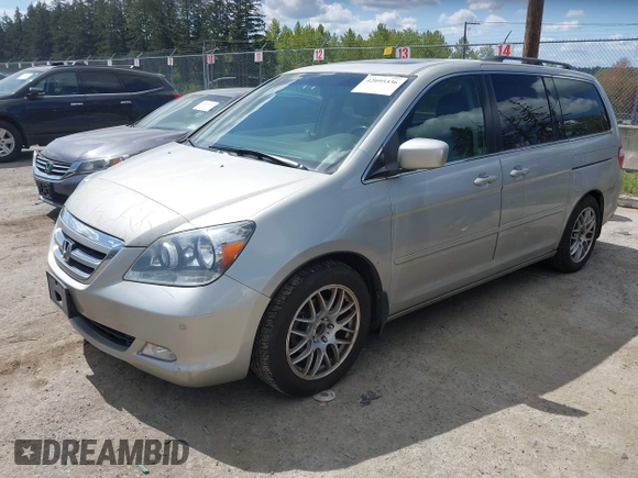 2006 Honda Odyssey TOURING with VIN 5FNRL38806B000049, listed as a IAAI auction lot 42095336 with 218,584 mi miles. Bid and sale history available at carsss.com. Image 2.
