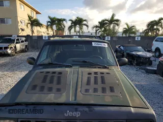 1998 Jeep Cherokee Country with VIN 1J4FT78S8XL520854, listed as a Copart auction lot 79304214 with 111,674 mi miles and Clean title. Bid and sale history available at DreamBid. Image 11.