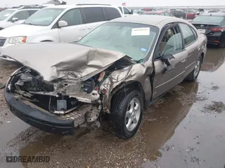 2004 Ford Taurus SE with VIN 1FAFP53U94A131211, listed as a IAAI auction lot 40930929 with 1 mi miles. Bid and sale history available at carsss.com. Image 2.