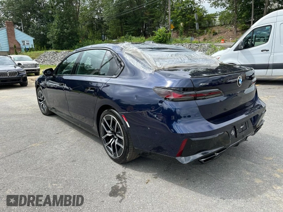 2023 BMW 7 Series 760i xDrive with VIN WBA33EJ06PCM02319, listed as a Copart auction lot 64957095 with 35,731 mi miles and Clean title. Bid and sale history available at DreamBid. Image 2.