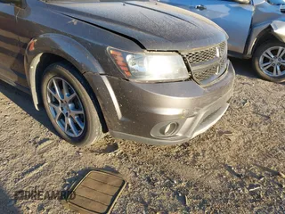2014 Dodge Journey R/T z VIN 3C4PDDEG3ET143096, wystawiony jako IAAI lot #41807983 z przebiegiem 154 210 mil mil oraz . Historia ofert i sprzedaży dostępna na DreamBid. Obrazek 1.
