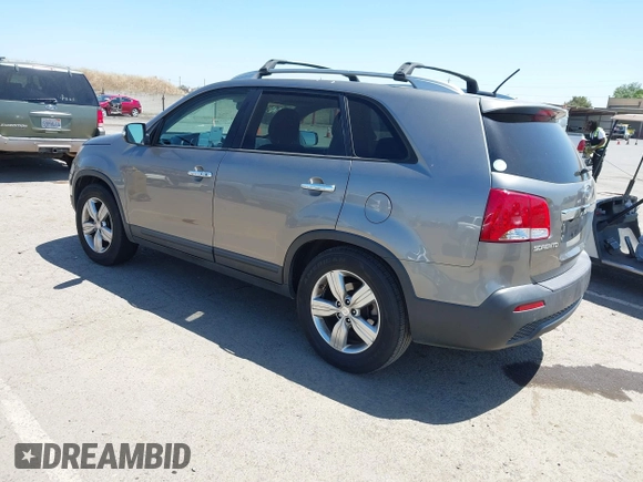 2013 Kia Sorento EX with VIN 5XYKU4A25DG411785, listed as a IAAI auction lot 42204291 with 203,501 mi miles and . Bid and sale history available at carsss.com. Image 3.
