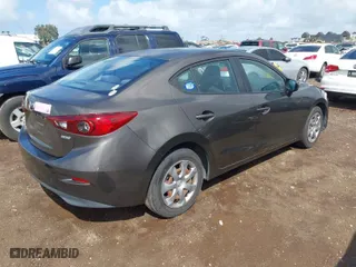 2014 Mazda Mazda3 i Sport with VIN JM1BM1U73E1197354, listed as a IAAI auction lot 41937634 with 140,074 mi miles. Bid and sale history available at carsss.com. Image 4.
