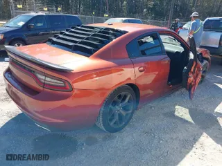 2020 Dodge Charger SXT with VIN 2C3CDXBG6LH249606, listed as a IAAI auction lot 41672492 with 93,580 mi miles. Bid and sale history available at carsss.com. Image 4.