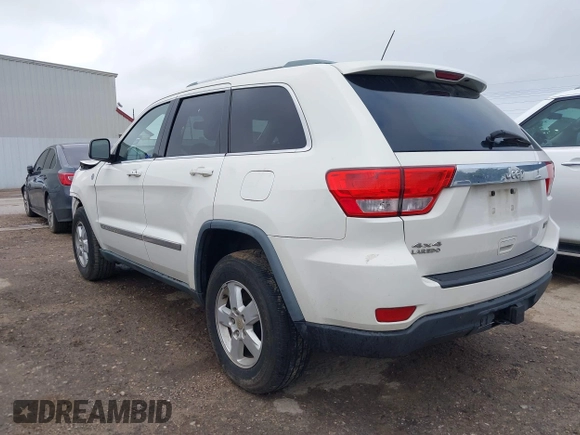 2012 Jeep Grand Cherokee Laredo with VIN 1C4RJFAG5CC224032, listed as a IAAI auction lot 42069334 with 106,614 mi miles. Bid and sale history available at carsss.com. Image 3.