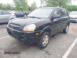 2009 Hyundai Tucson GLS with VIN KM8JM12B59U990027, listed as a IAAI auction lot 42195935 with 170,875 mi miles. Bid and sale history available at carsss.com. Image 2.