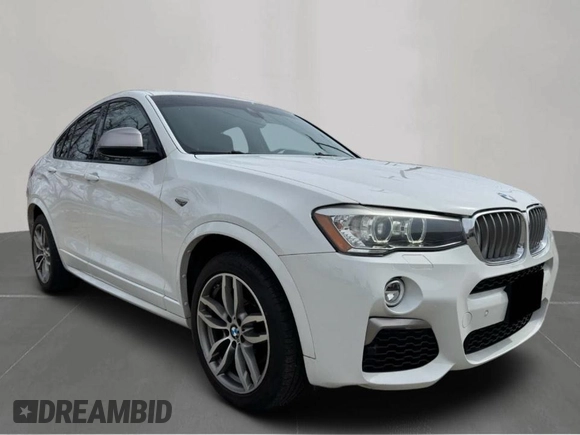 2018 BMW X4 M40i z VIN 5UXXW7C52J0W64992, wystawiony jako Copart lot #49122325 z przebiegiem 97 967 mil mil oraz Czysty tytuł • Clean title. Historia ofert i sprzedaży dostępna na DreamBid. Obrazek 1.