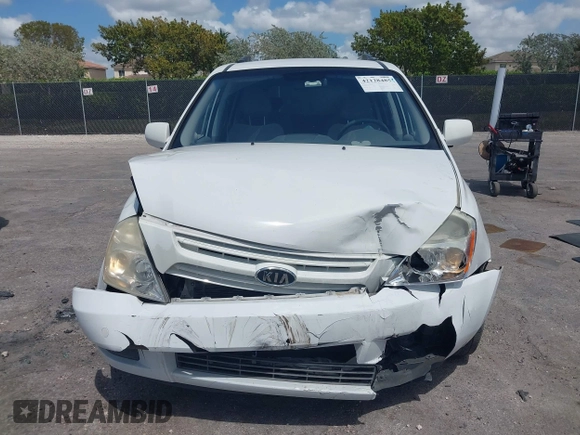 2010 Kia Sedona LX with VIN KNDMG4C33A6338047, listed as a IAAI auction lot 42128485 with 99,498 mi miles and . Bid and sale history available at carsss.com. Image 13.