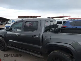 2022 Toyota Tacoma SR with VIN 3TYAX5GN8NT066318, listed as a IAAI auction lot 41739981 with 50,186 mi miles and . Bid and sale history available at DreamBid. Image 14.