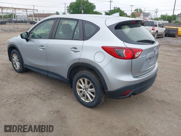 2016 Mazda CX-5 Sport z VIN JM3KE4BY1G0711602, wystawiony jako IAAI lot #42537627 z przebiegiem Nie podano mil oraz . Historia ofert i sprzedaży dostępna na DreamBid. Obrazek 3.