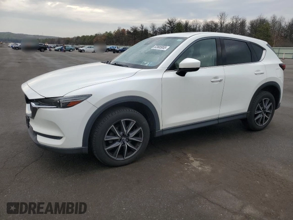 2017 Mazda CX-5 Grand Touring with VIN JM3KFBDL1H0208186, listed as a Copart auction lot 52685955 with 125,414 mi miles and Salvage Title. Bid and sale history available at carsss.com. Image 1.