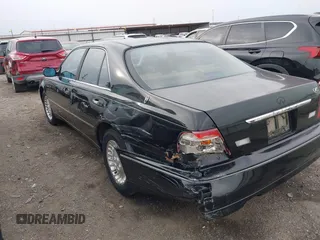 1999 Infiniti Q45 z VIN JNKBY31A3XM602466, wystawiony jako IAAI lot #41721377 z przebiegiem 113 158 mil mil oraz . Historia ofert i sprzedaży dostępna na DreamBid. Obrazek 3.