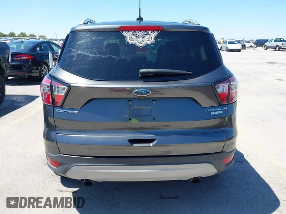 2017 Ford Escape Titanium with VIN 1FMCU0J97HUE07747, listed as a IAAI auction lot 41977788 with 104,560 mi miles. Bid and sale history available at carsss.com. Image 16.