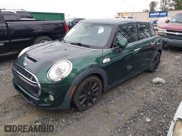 2016 MINI Cooper Hardtop 4 Door S with VIN WMWXU3C58G2D31595, listed as a IAAI auction lot 41267547 with 145,191 mi miles. Bid and sale history available at carsss.com. Image 17.