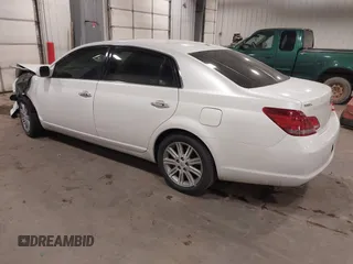 2010 Toyota Avalon XL with VIN 4T1BK3DB9AU358803, listed as a IAAI auction lot 41072257 with 157,185 mi miles and . Bid and sale history available at DreamBid. Image 3.
