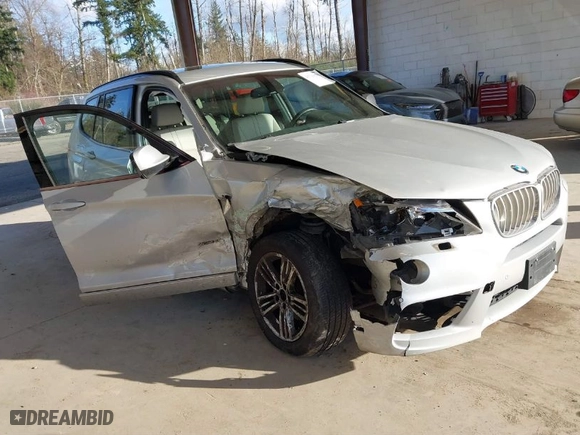 2011 BMW X3 28i with VIN 5UXWX5C58BL709561, listed as a IAAI auction lot 41741294 with 138,231 mi miles. Bid and sale history available at carsss.com. Image 1.