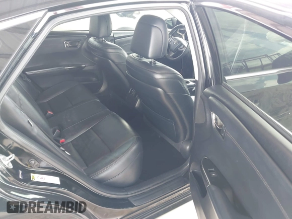 2013 Toyota Avalon XLE with VIN 4T1BK1EB6DU056103, listed as a IAAI auction lot 42553318 with 114,143 mi miles and . Bid and sale history available at DreamBid. Image 8.
