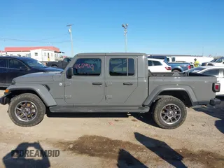 2021 Jeep Gladiator Overland with VIN 1C6HJTFG0ML507773, listed as a IAAI auction lot 41617970 with 95,816 mi miles and . Bid and sale history available at DreamBid. Image 14.