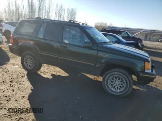 1995 Jeep Grand Cherokee Limited with VIN 1J4GZ78S7SC613568, listed as a Copart auction lot 83365584 with 184,099 mi miles and Salvage Title. Bid and sale history available at carsss.com. Image 4.