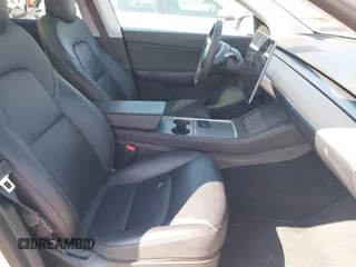 2021 Tesla Model Y Long Range with VIN 5YJYGDEE4MF122362, listed as a IAAI auction lot 42096138 with 47,006 mi miles and . Bid and sale history available at DreamBid. Image 5.