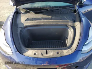 2022 Tesla Model Y Long Range z VIN 7SAYGDEE4NF408202, wystawiony jako Copart lot #51790905 z przebiegiem 43 509 mil mil oraz Szkody całkowita. Historia ofert i sprzedaży dostępna na DreamBid. Obrazek 13.