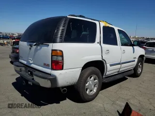 2004 GMC Yukon SLE with VIN 1GKEK13T54J168734, listed as a Copart auction lot 71235204 with 174,429 mi miles and Salvage Title. Bid and sale history available at carsss.com. Image 3.