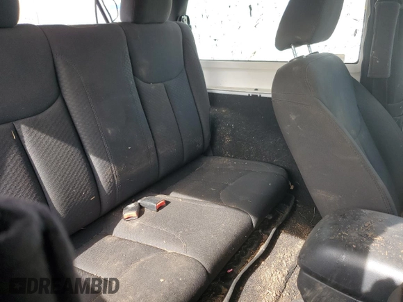 2016 Jeep Wrangler Willys Wheeler z VIN 1C4AJWAG4GL243285, wystawiony jako Copart lot #58035425 z przebiegiem 100 251 mil mil oraz Szkoda całkowita • Salvage title. Historia ofert i sprzedaży dostępna na DreamBid. Obrazek 11.