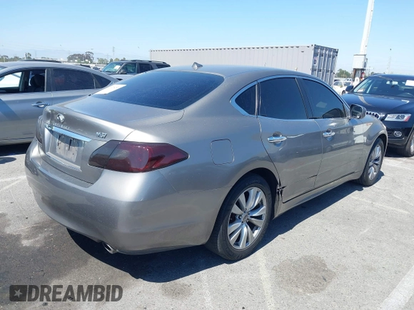 2011 Infiniti M with VIN JN1BY1AP7BM321776, listed as a IAAI auction lot 42320450 with 117,831 mi miles and . Bid and sale history available at DreamBid. Image 4.