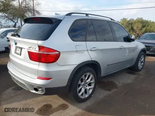 2011 BMW X5 35i with VIN 5UXZV4C5XBL407637, listed as a IAAI auction lot 41454552 with 204,510 mi miles. Bid and sale history available at carsss.com. Image 4.