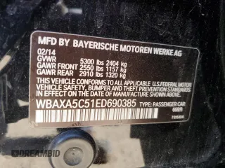 2014 BMW 5 Series 535d with VIN WBAXA5C51ED690385, listed as a Copart auction lot 57290645 with 161,694 mi miles and Salvage title. Bid and sale history available at DreamBid. Image 12.