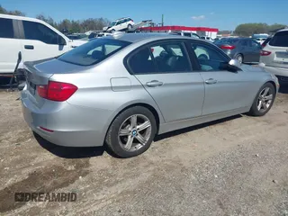 2013 BMW 3 Series 328i with VIN WBA3C1G52DNR44660, listed as a IAAI auction lot 41994277 with 165,151 mi miles and . Bid and sale history available at carsss.com. Image 4.