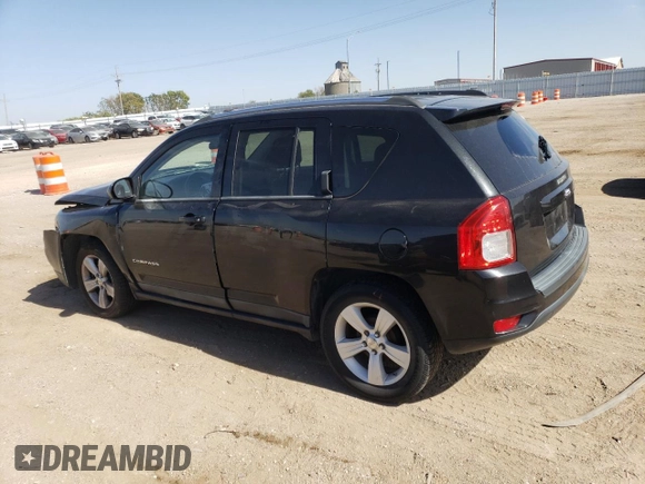 2011 Jeep Compass with VIN 1J4NT1FA4BD159872, listed as a Copart auction lot 74118834 with 142,660 mi miles and Salvage Title. Bid and sale history available at carsss.com. Image 2.