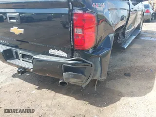 2015 Chevrolet Silverado 1500 High Country with VIN 3GCUKTEC9FG355379, listed as a IAAI auction lot 41923900 with 253,497 mi miles. Bid and sale history available at carsss.com. Image 18.