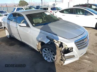 2015 Cadillac CTS AWD z VIN 1G6AW5SX2F0104981, wystawiony jako IAAI lot #41276740 z przebiegiem 87 128 mil mil oraz . Historia ofert i sprzedaży dostępna na DreamBid. Obrazek 1.