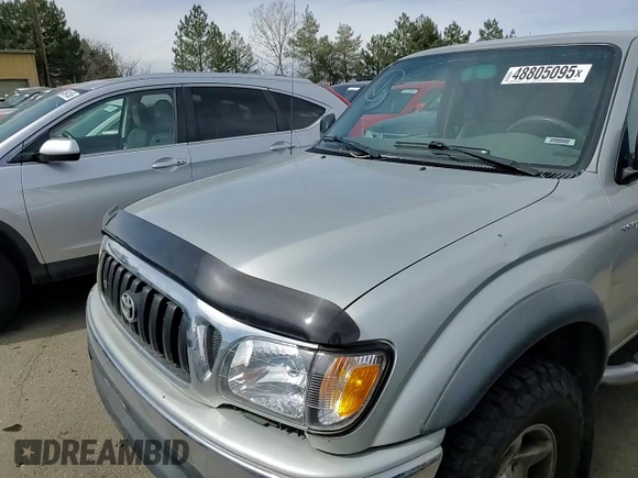 2002 Toyota Tacoma z VIN 5TEWN72N32Z087330, wystawiony jako Copart lot #48805095 z przebiegiem Nie podano mil oraz Szkoda całkowita • Salvage title. Historia ofert i sprzedaży dostępna na DreamBid. Obrazek 11.