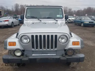 2004 Jeep Wrangler Sport with VIN 1J4FA49S64P749380, listed as a IAAI auction lot 41935405 with 84,690 mi miles. Bid and sale history available at carsss.com. Image 12.