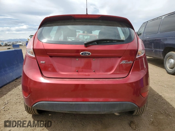 2016 Ford Fiesta SE z VIN 3FADP4EJ1GM130629, wystawiony jako Copart lot #51976355 z przebiegiem 119 337 mil mil oraz Szkoda całkowita • Salvage title. Historia ofert i sprzedaży dostępna na DreamBid. Obrazek 6.
