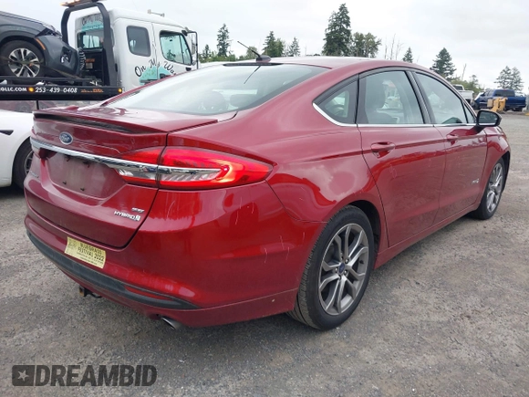 2017 Ford Fusion Hybrid SE с VIN 3FA6P0LU6HR324771, выставлен на аукционе IAAI как лот 42612195 с пробегом 103 988 миль миль и . История ставок и продаж доступна на DreamBid. Изображение 4.