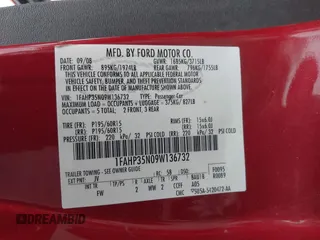 2009 Ford Focus SE with VIN 1FAHP35N09W136732, listed as a IAAI auction lot 42061783 with 143,993 mi miles. Bid and sale history available at carsss.com. Image 9.