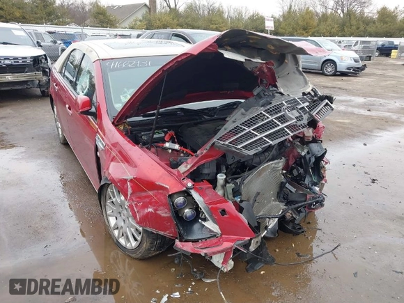 2011 Cadillac STS RWD with VIN 1G6DW6ED4B0128004, listed as a IAAI auction lot 41664631 with 546,850 mi miles and . Bid and sale history available at carsss.com. Image 1.