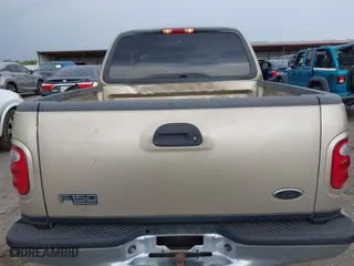 2001 Ford F-150 SuperCrew XLT with VIN 1FTRW07W61KE35305, listed as a IAAI auction lot 41912087 with 221,826 mi miles. Bid and sale history available at carsss.com. Image 16.